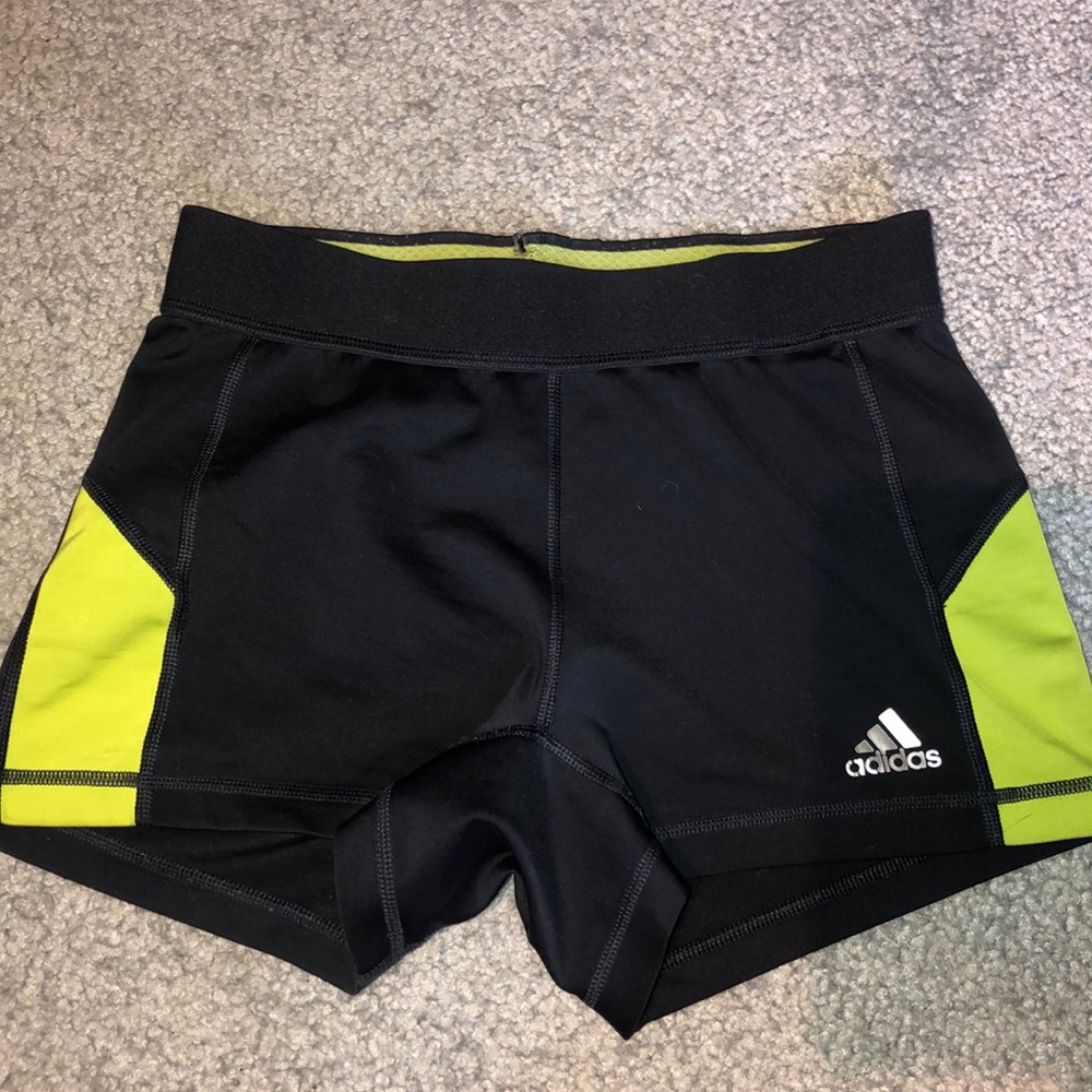 Gray and green compression shorts